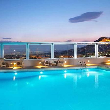 Divani Caravel Athen Exterior foto The pool at the hotel