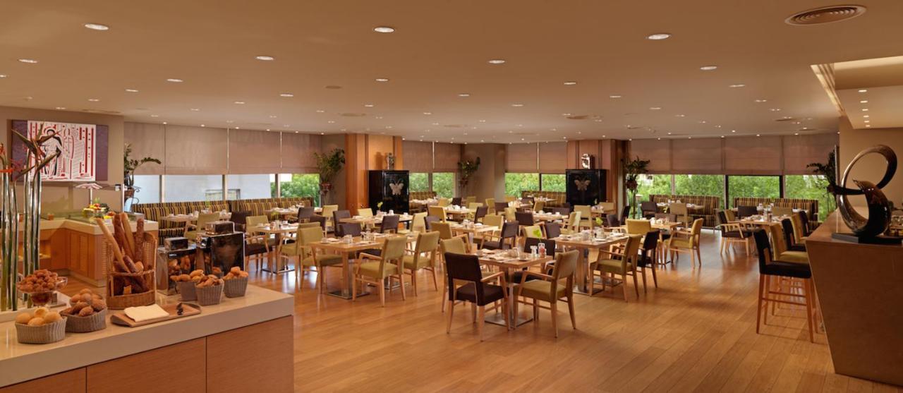 Divani Caravel Athen Exterior foto The restaurant