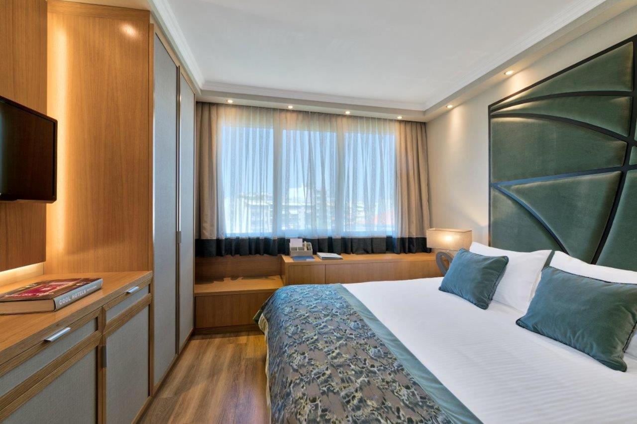 Divani Caravel Athen Exterior foto A room at the hotel